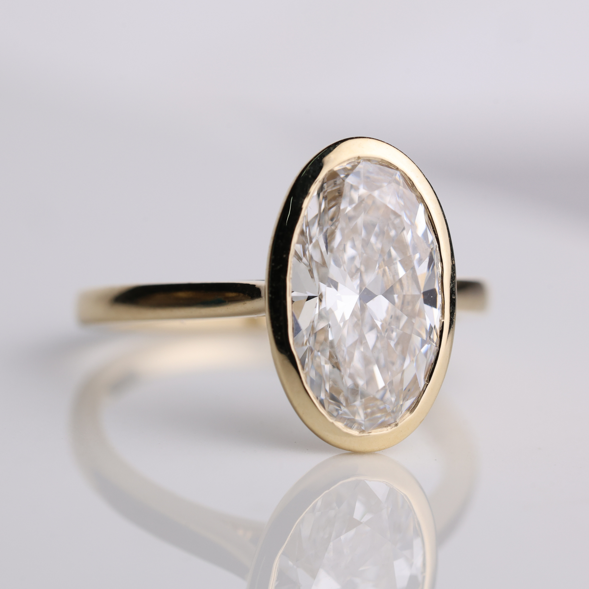 14K Gold Bezel Set Oval Lab Diamond Engagement Ring