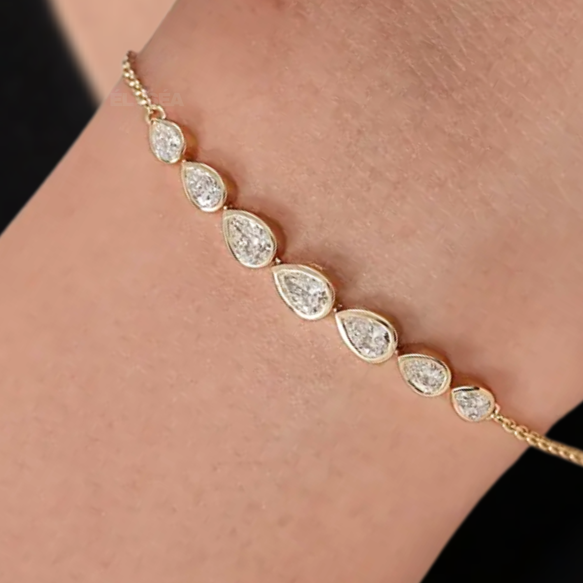 Bezel Set Pear Shaped Lab Grown Diamond Bracelet in 14k Yellow Gold