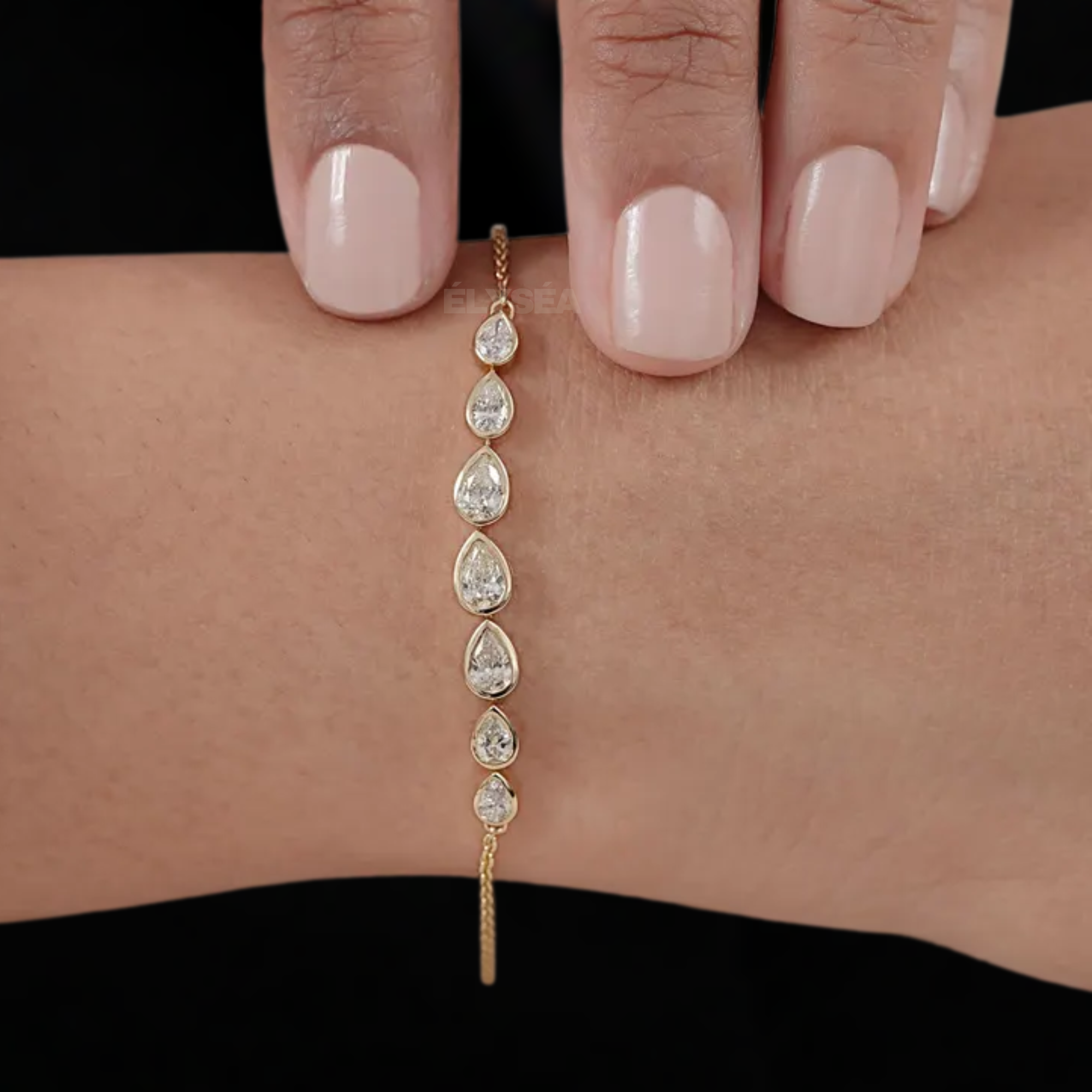 Bezel Set Pear Shaped Lab Grown Diamond Bracelet in 14k Yellow Gold