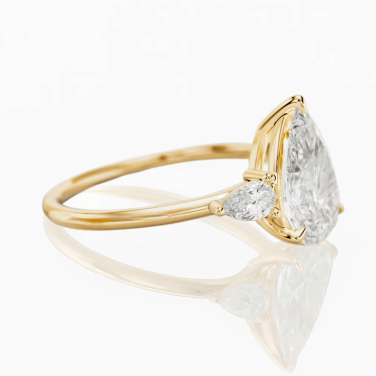 14K Gold Pear Shaped Three Stone Engagement Ring