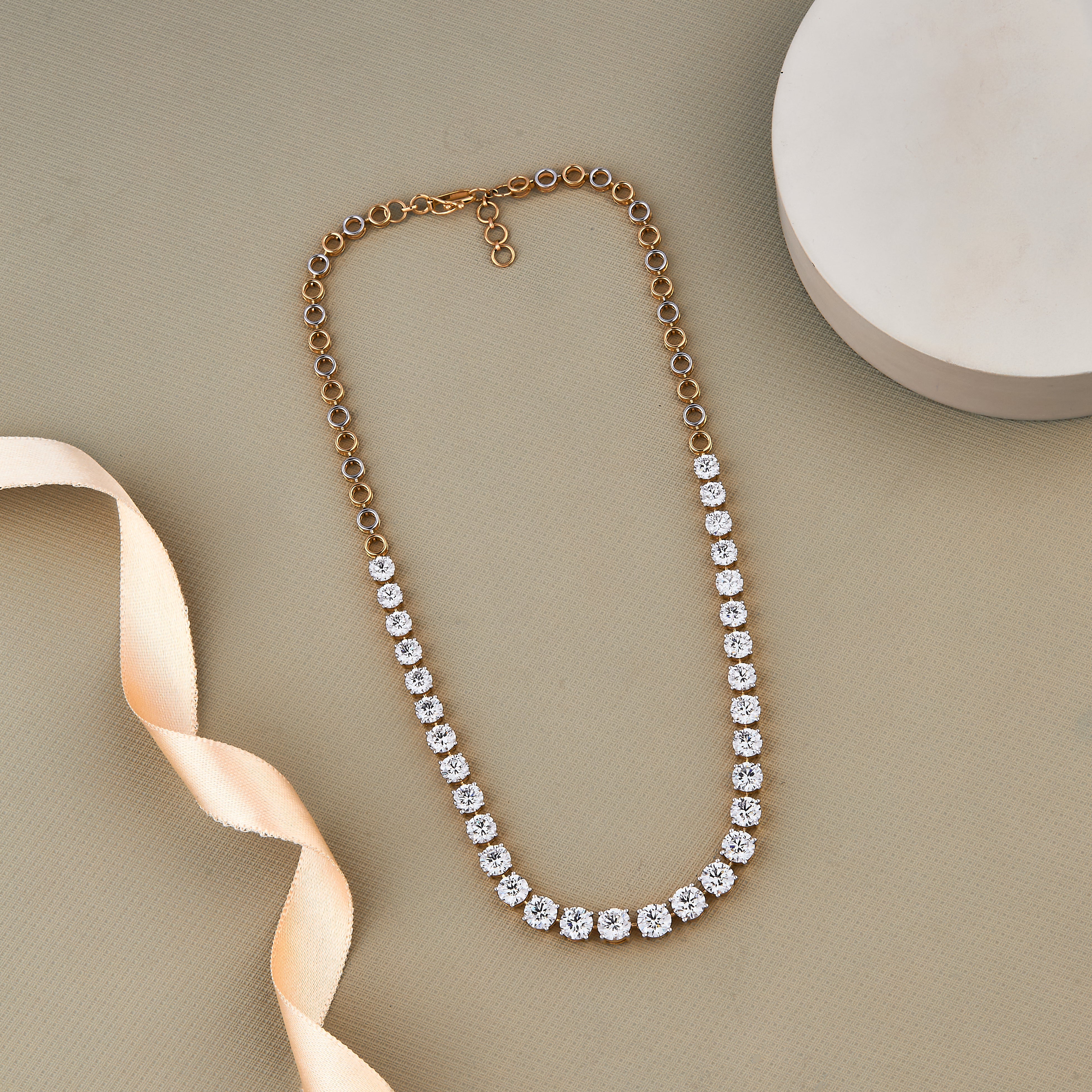 Lab-grown diamond tennis necklace featuring round brilliant diamonds prong-set in 14K gold, total weight 22.92 CTW, 16-inch length