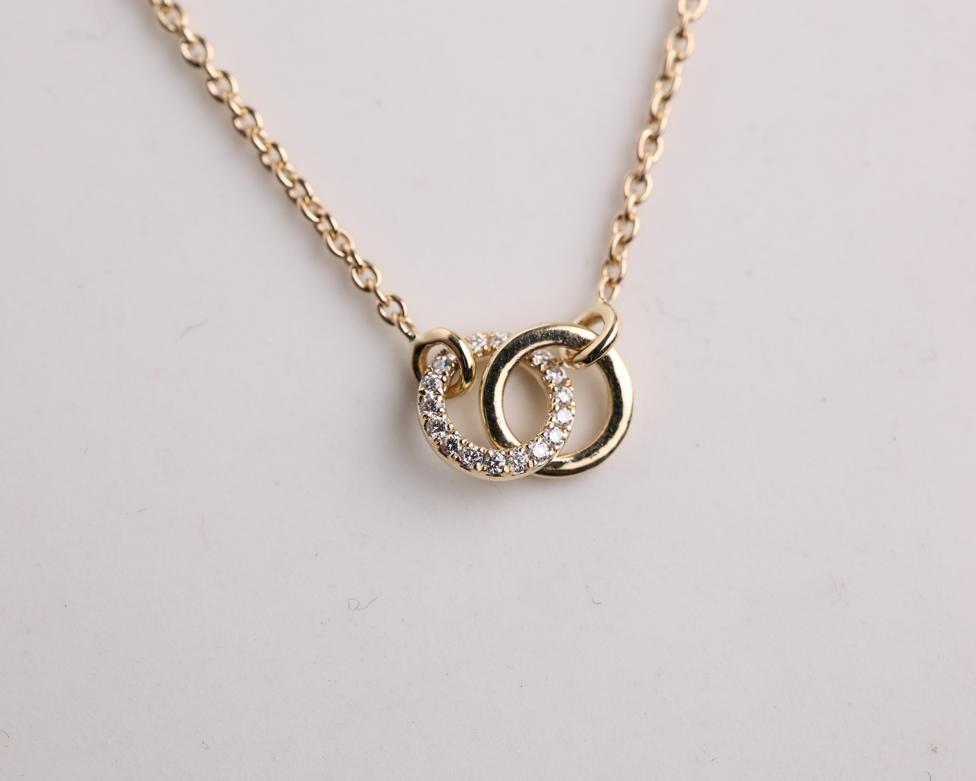 0.05 Ctw Diamond Intertwined Circle Necklace in 14K Solid Gold