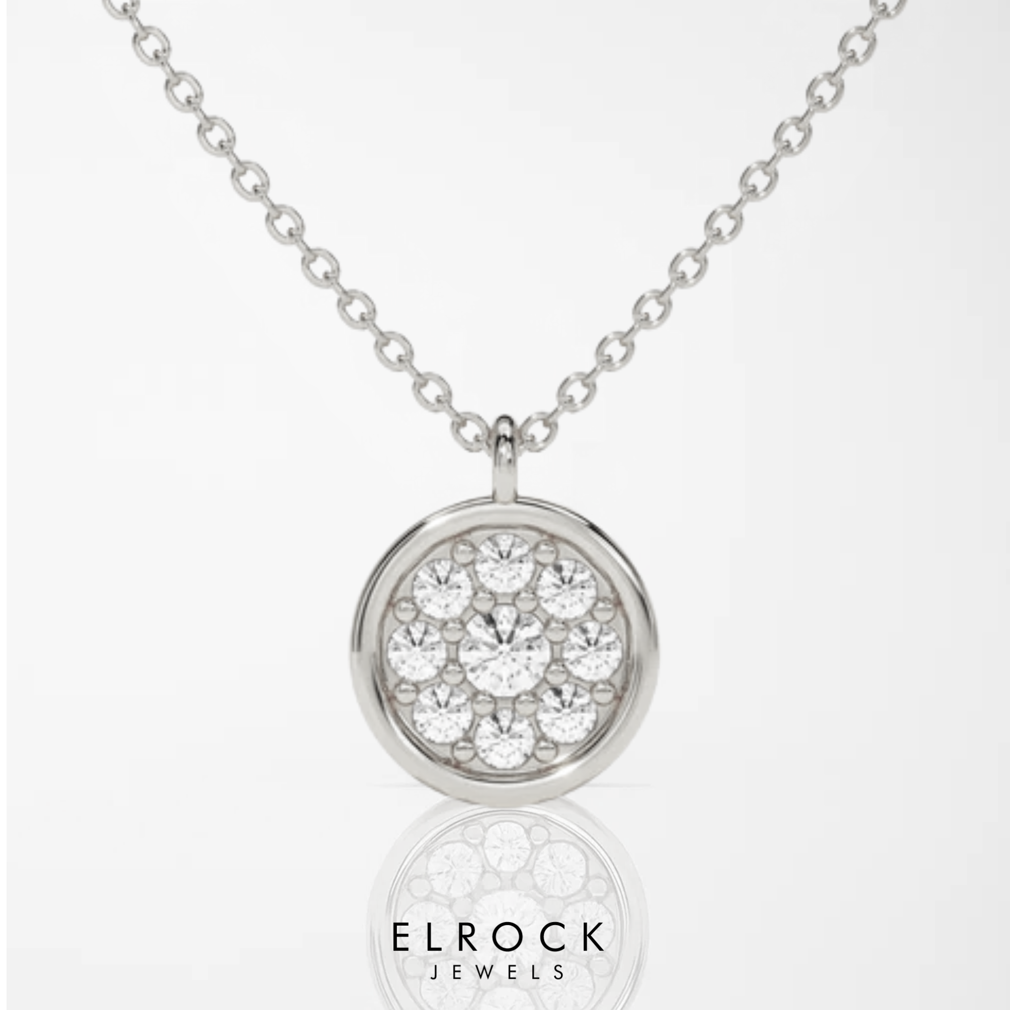 Gold necklace with a round pendant featuring crystals