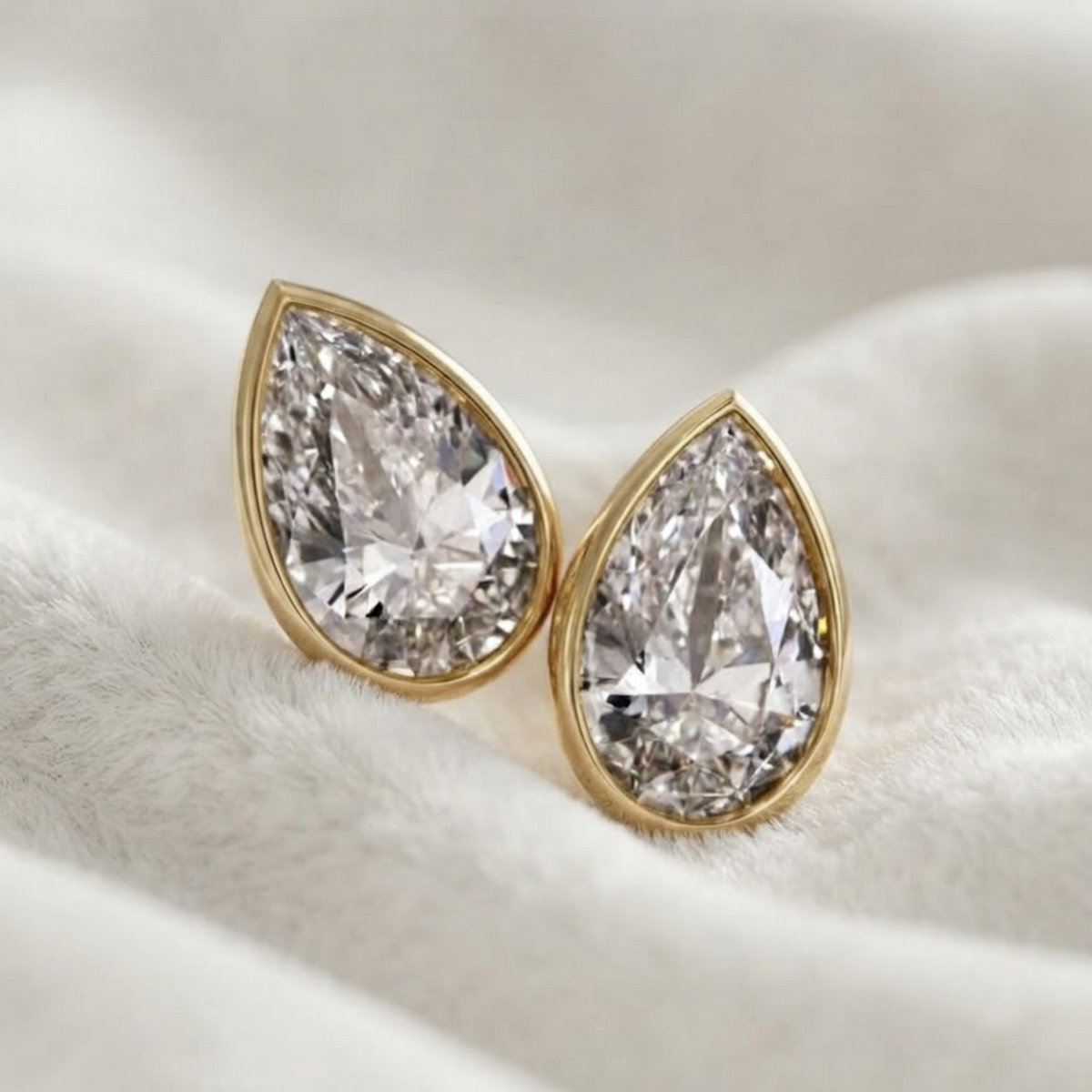 Bezel Set Pear Shape Lab Grown Diamond Stud Earrings