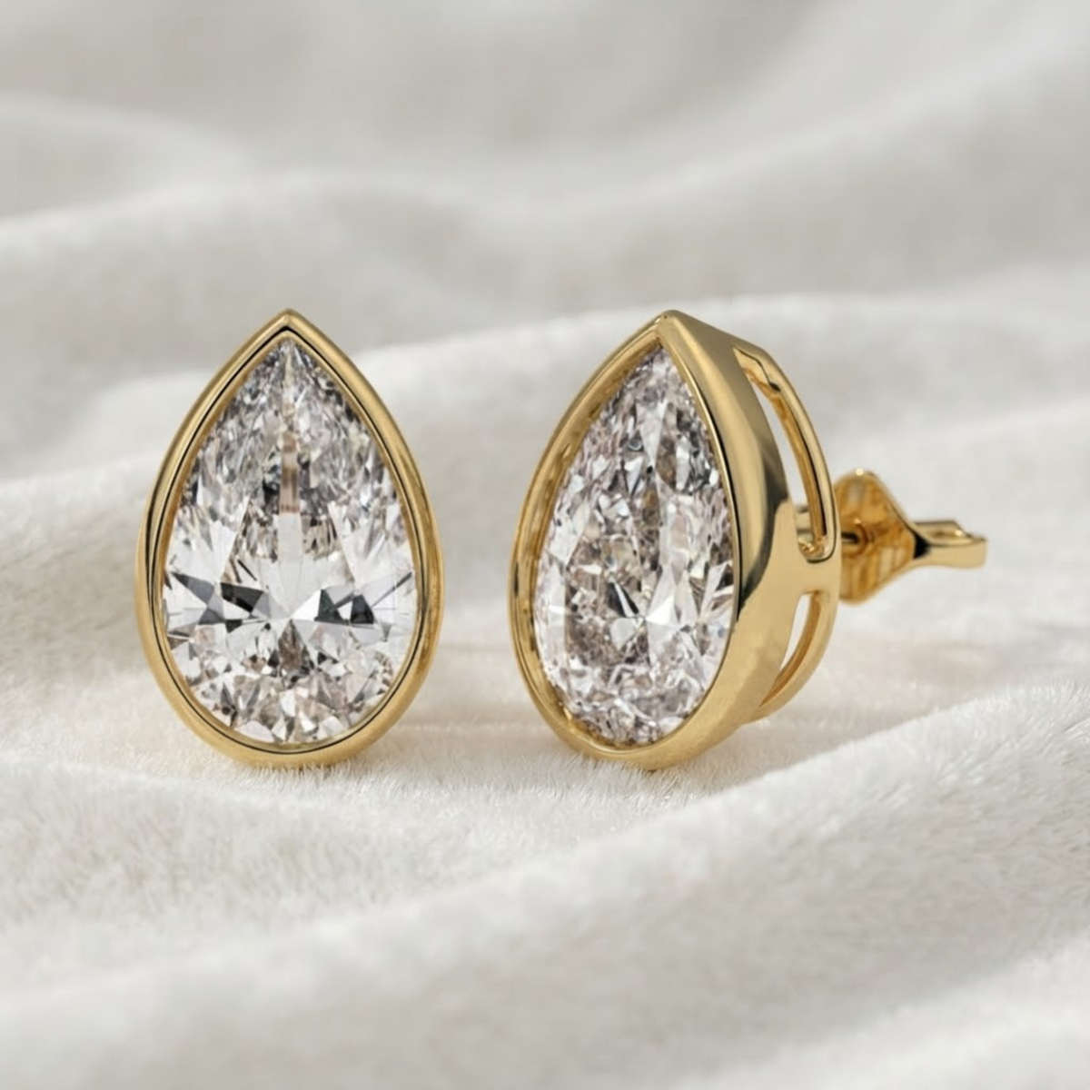 Bezel Set Pear Shape Lab Grown Diamond Stud Earrings
