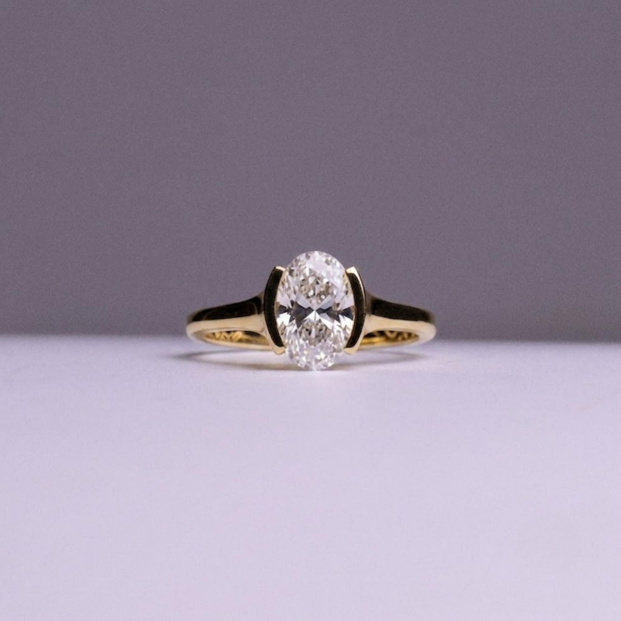 Oval Half Bezel Solitaire Engagement Ring