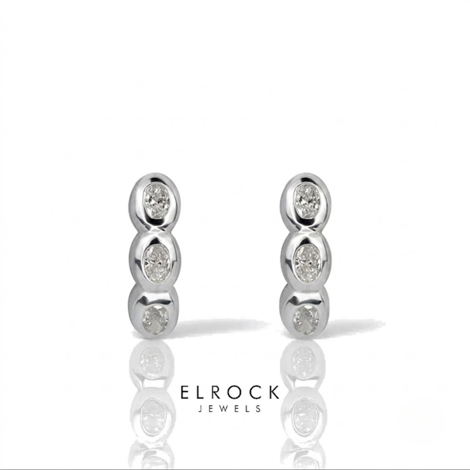 Three Diamond Oval Drop Earrings