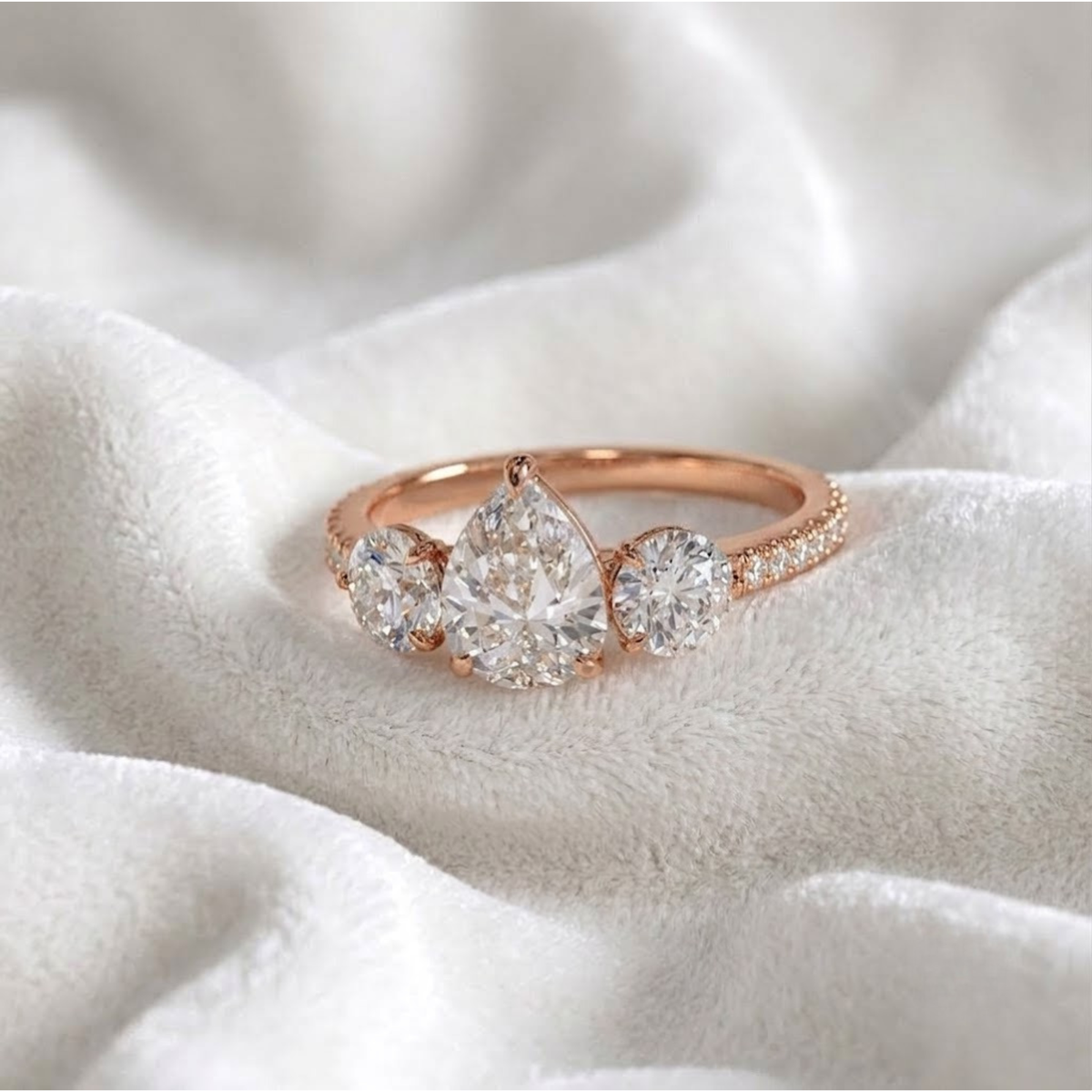 Pear Shaped Three Stone Solitaire Engagement Ring