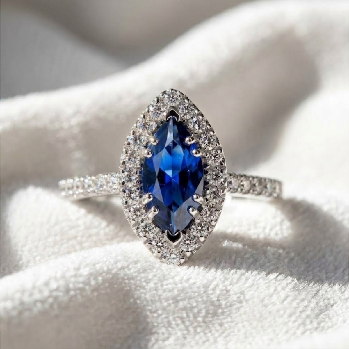Halo Marquise Blue Sapphire Engagement Ring.