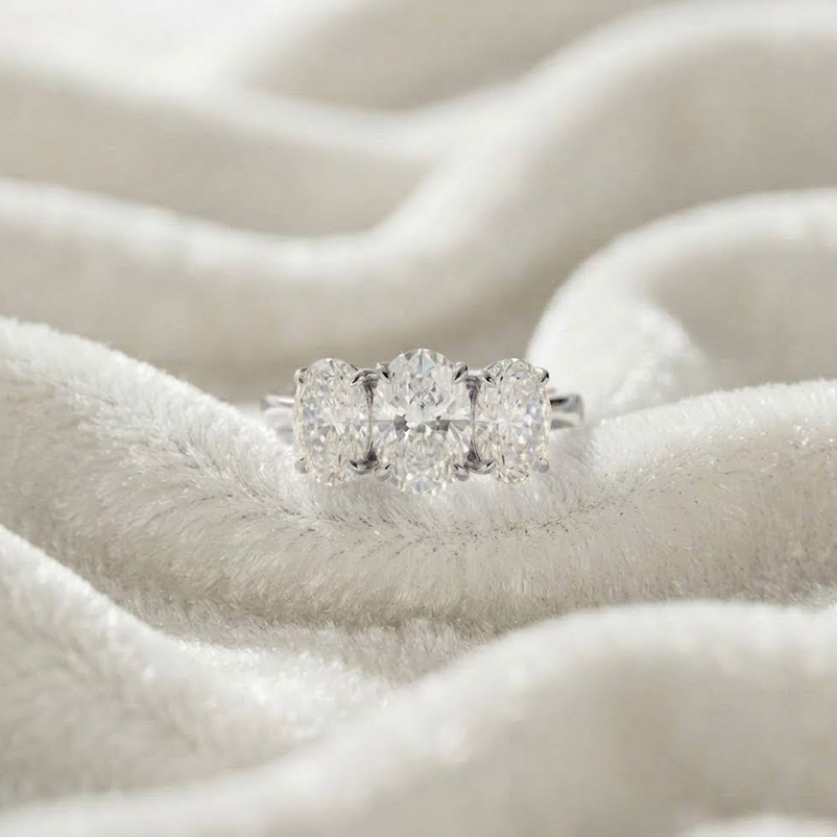 Oval Three Stone Engagement Ring