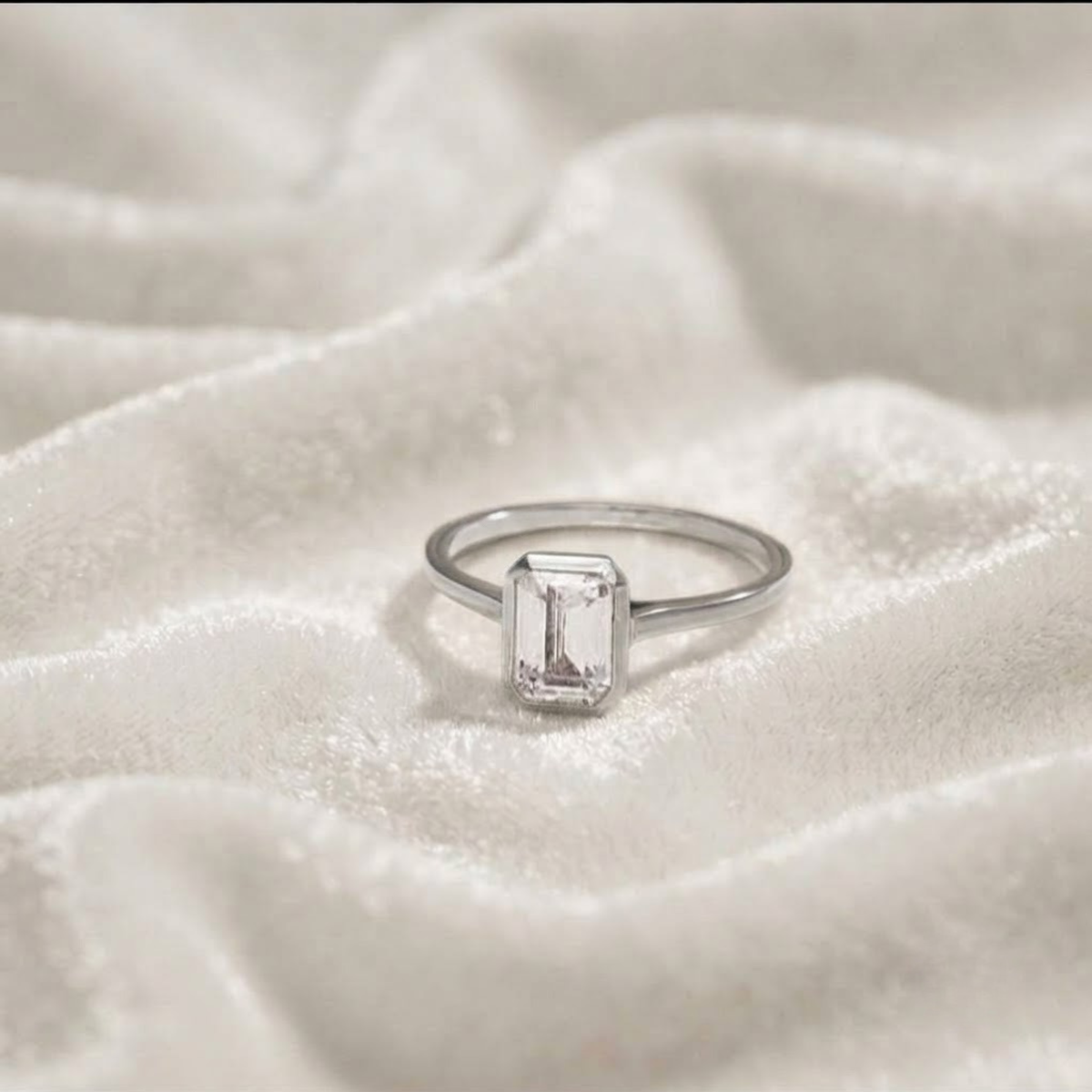 Emerald Cut Bezel Set Engagement Ring