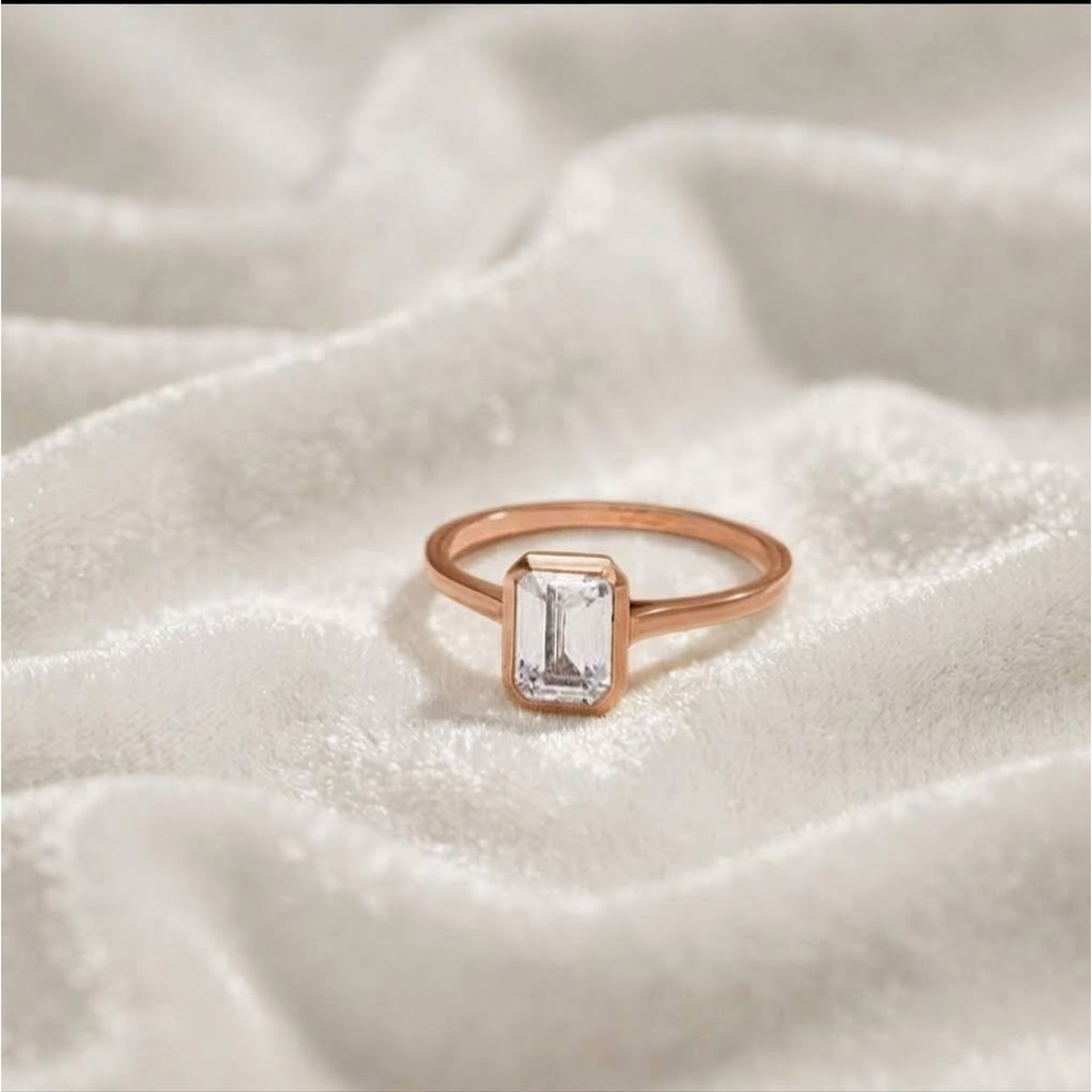 Emerald Cut Bezel Set Engagement Ring
