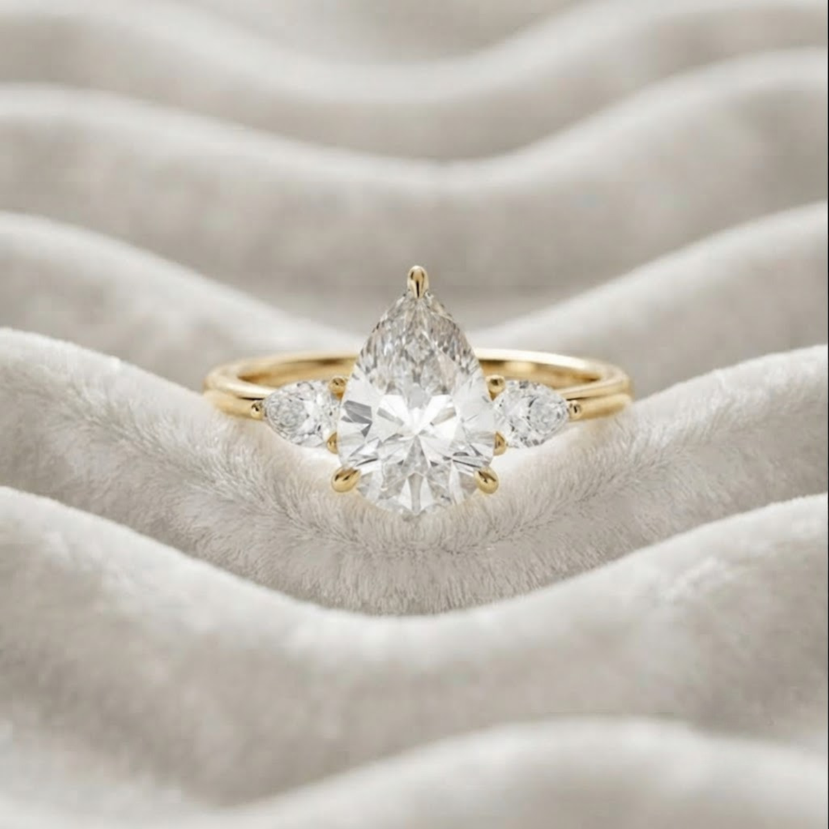 Pear Shaped Three Stone Engagement Ring