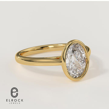 IGI Certified F Color VS1 Clarity Oval Cut Bezel Setting Lab Grown Diamond Engagement Ring In 14K Gold