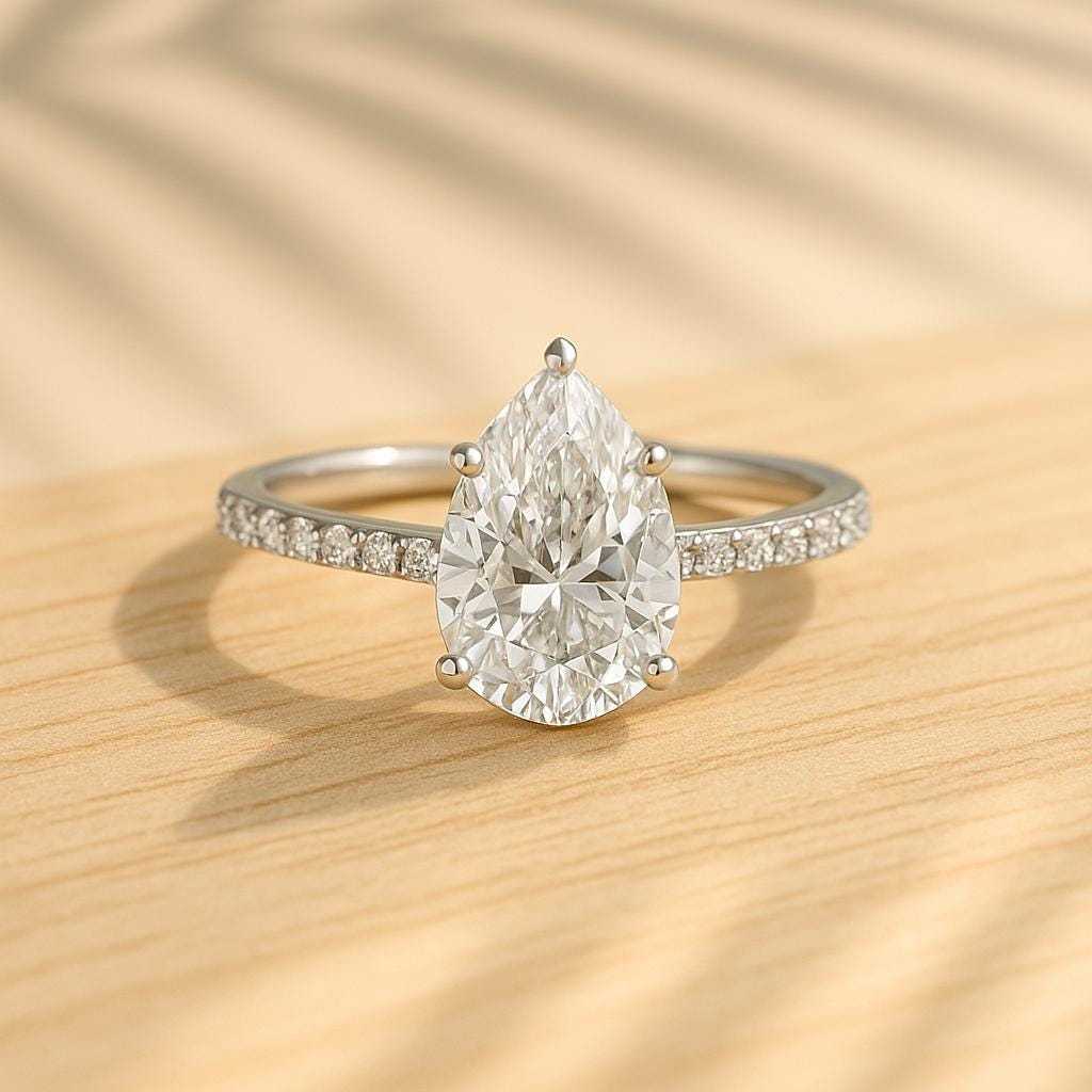 Pear Cut Diamond Halo Engagement Ring