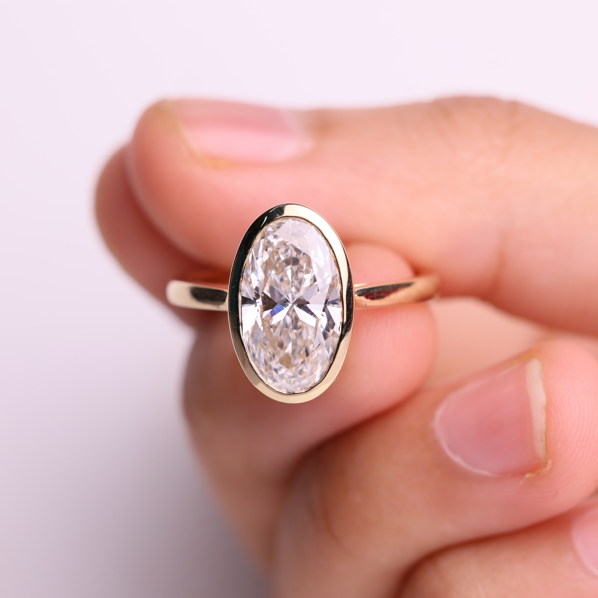 14K Gold Oval 2 Carat Lab Grown Diamond Bezel Set Solitaire Engagement Ring