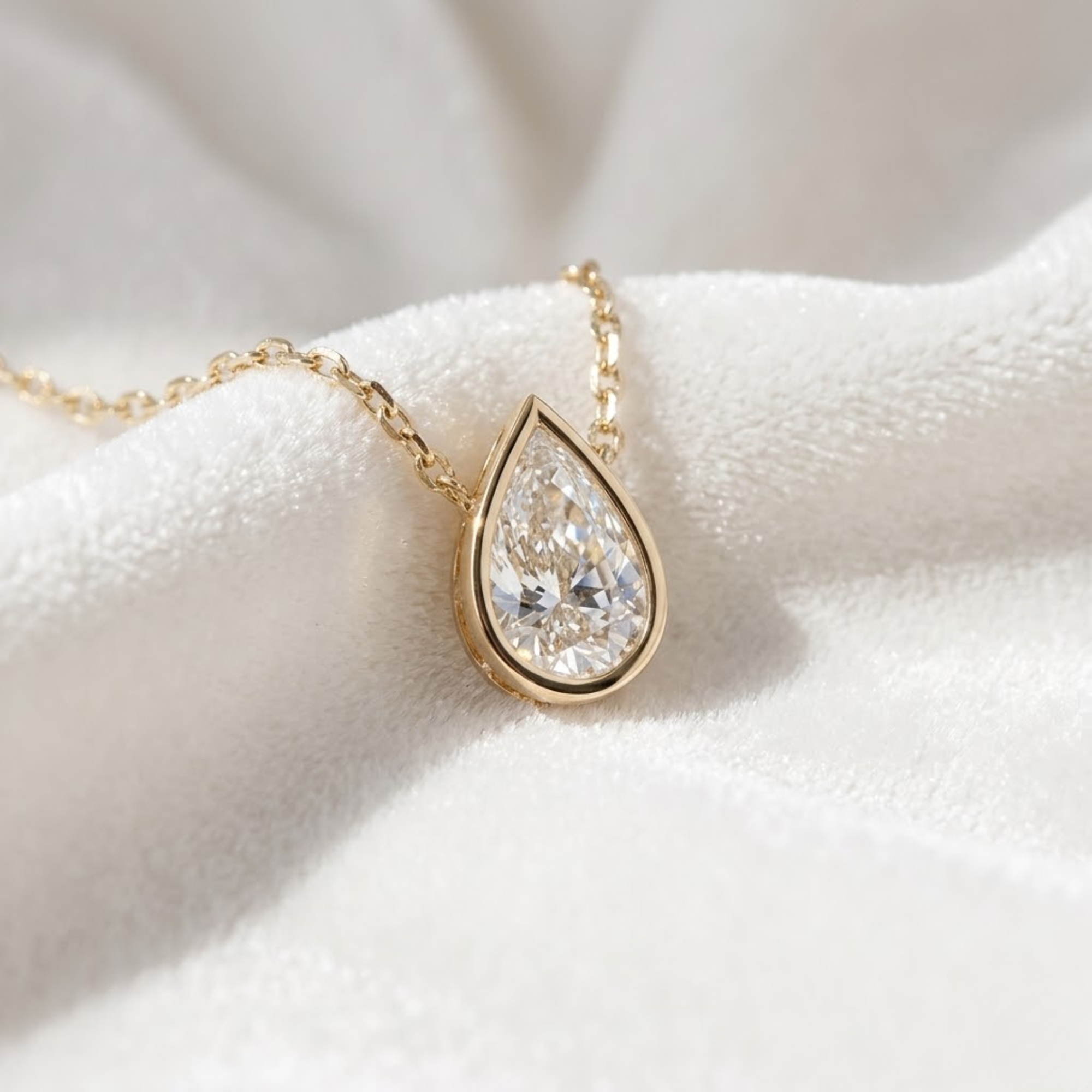 14K Gold 1CT Pear Shape Bezel Set Solitaire Diamond Pendant