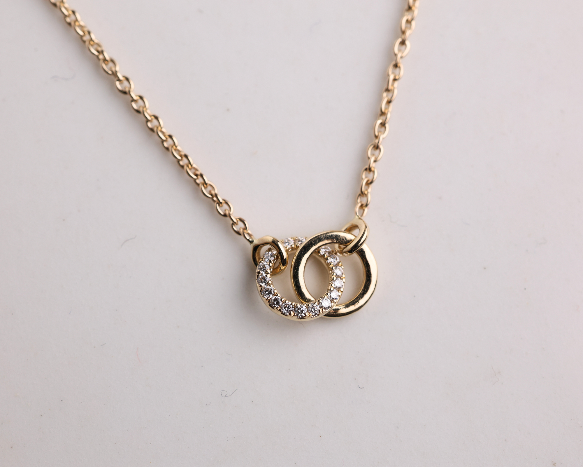 0.05 Ctw Diamond Intertwined Circle Necklace in 14K Solid Gold