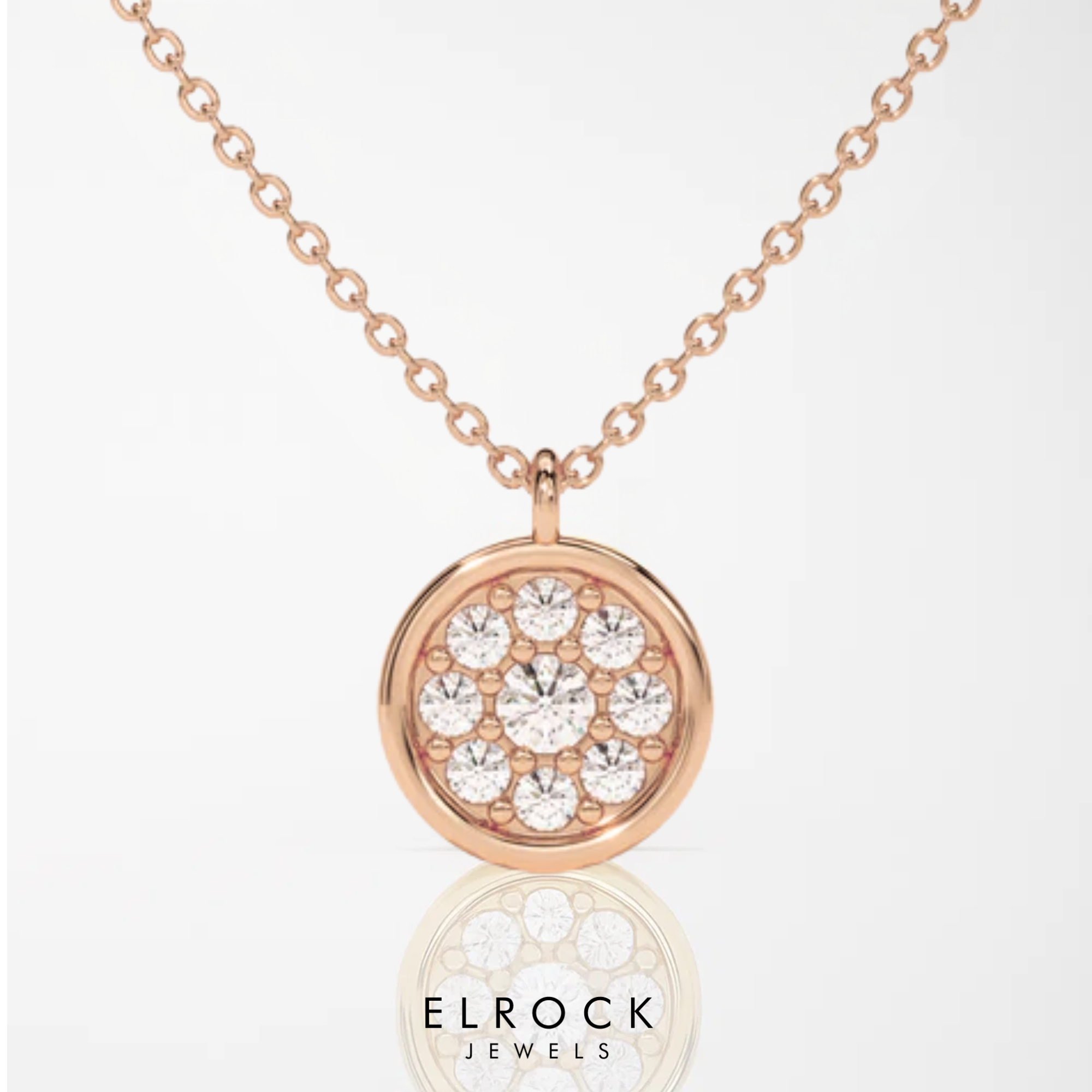 Gold necklace with a round pendant featuring crystals 