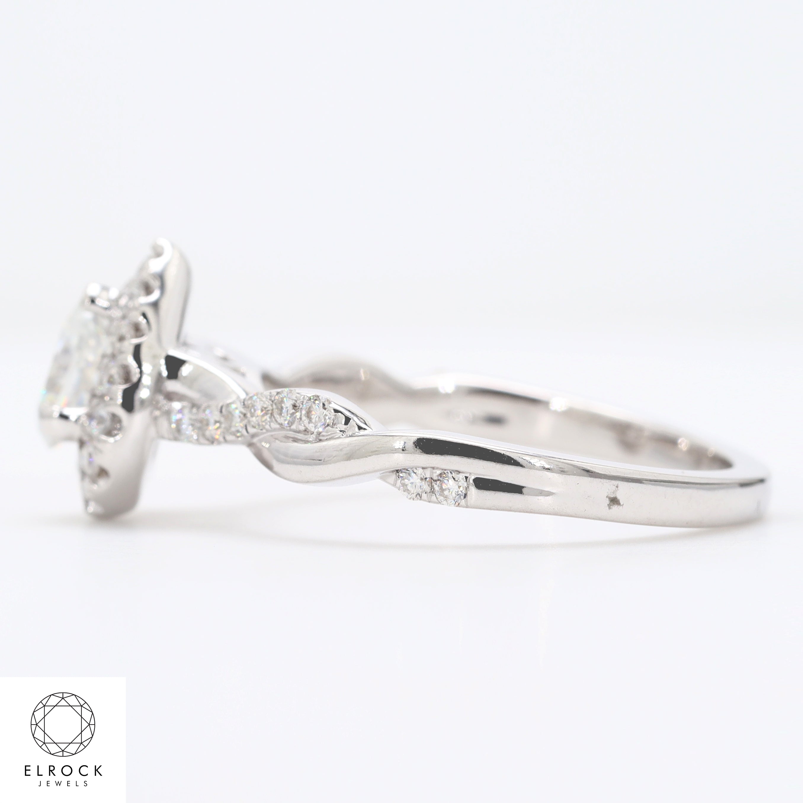 14K Pear Shape Twist and turn Prong Solitaire Engagement Ring