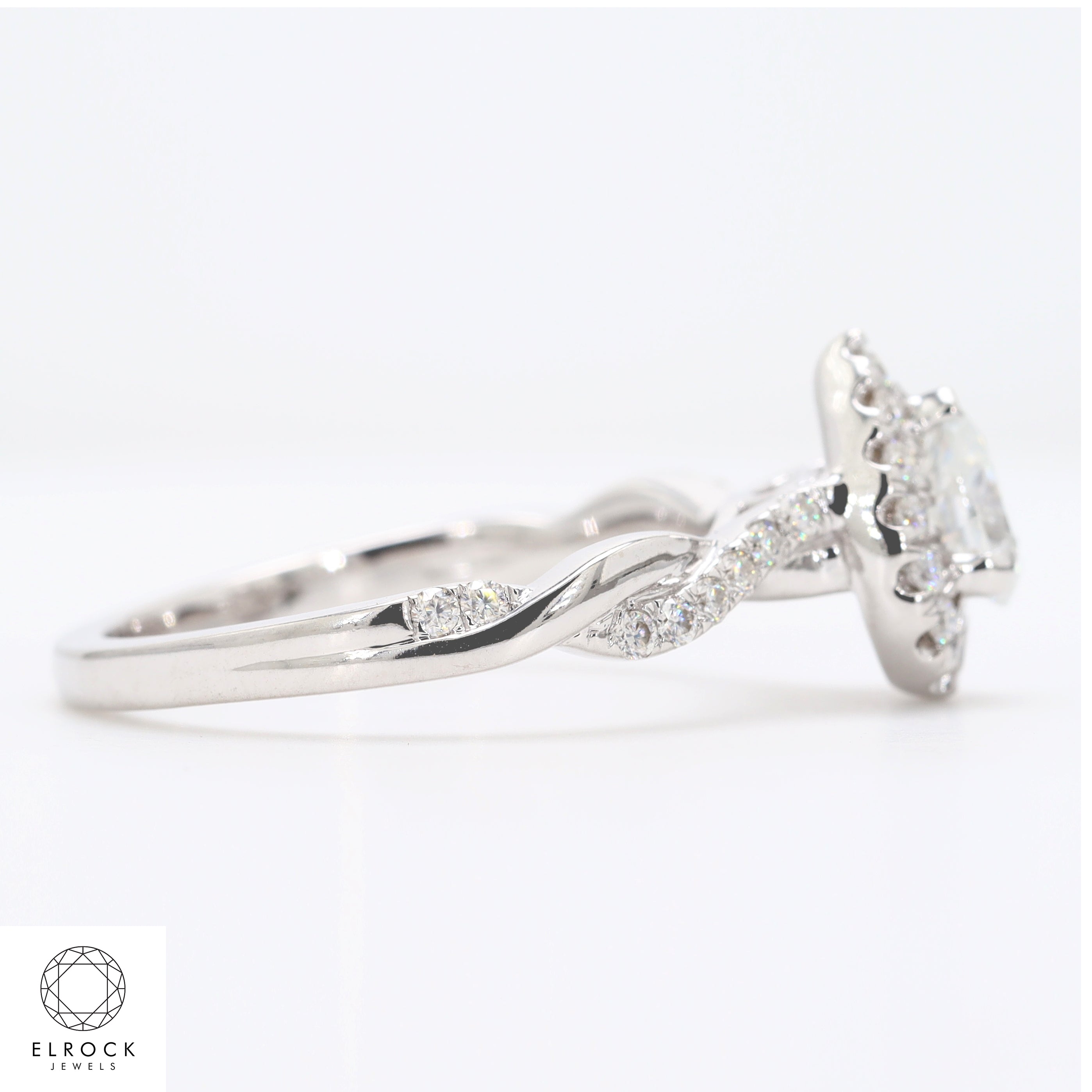 14K Pear Shape Twist and turn Prong Solitaire Engagement Ring