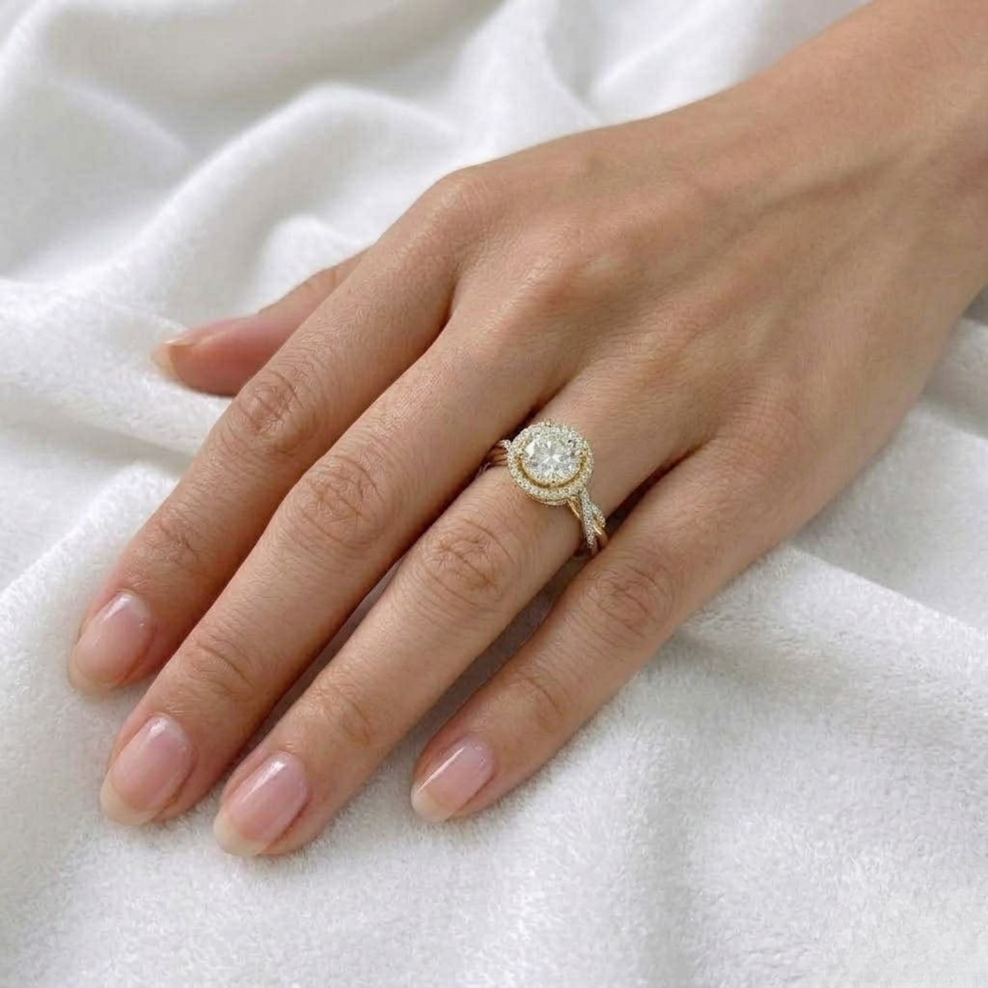 Round Cut Diamond Hidden Halo Twist Engagement Ring