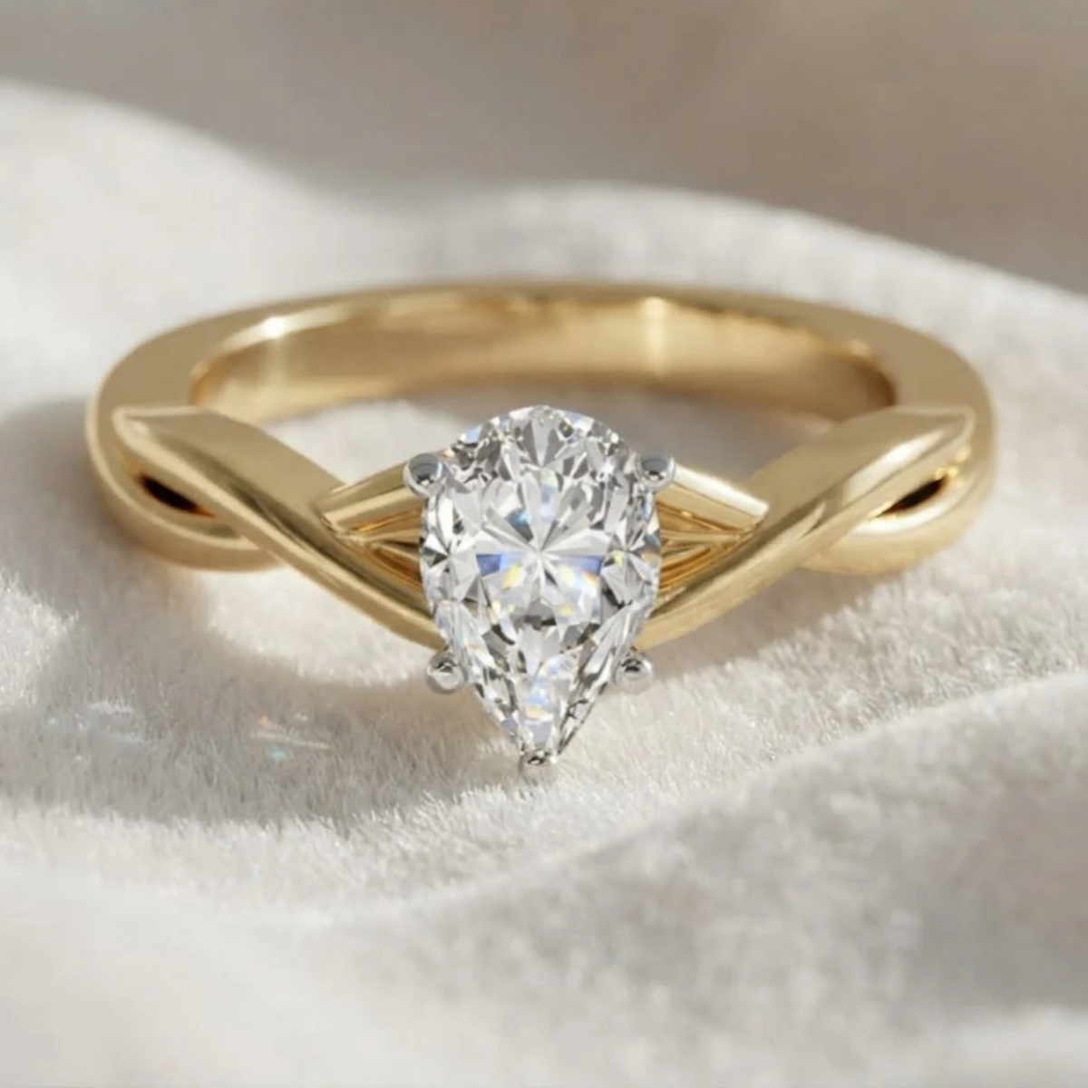 Pear shape lab grown diamond Twisted engagement ring