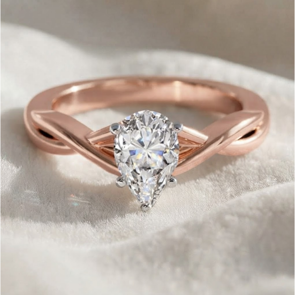Pear shape lab grown diamond Twisted engagement ring