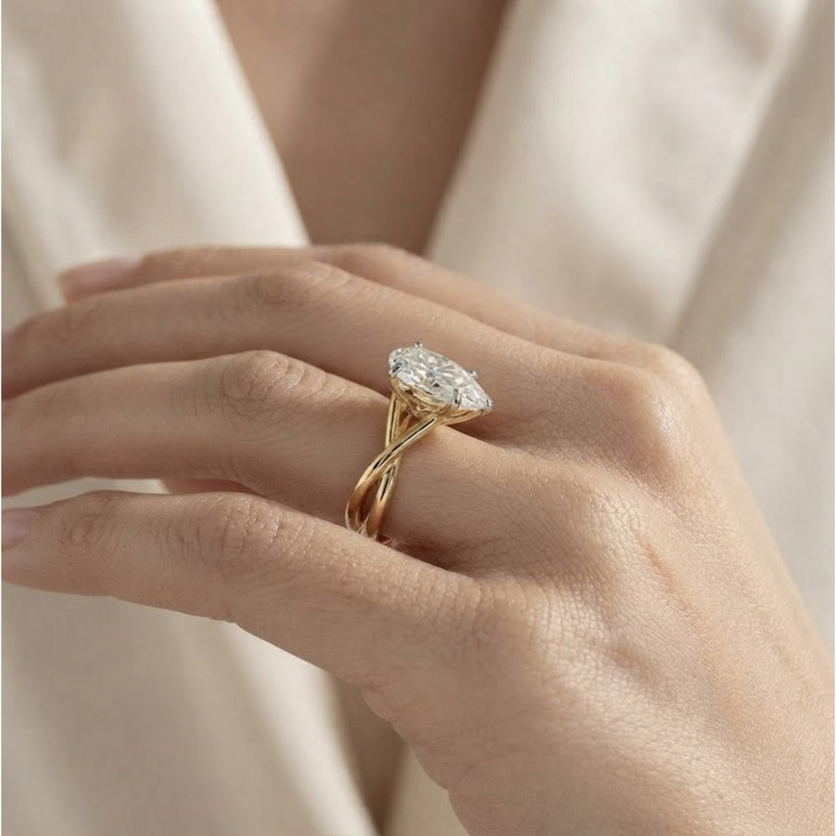 Pear shape lab grown diamond Twisted engagement ring