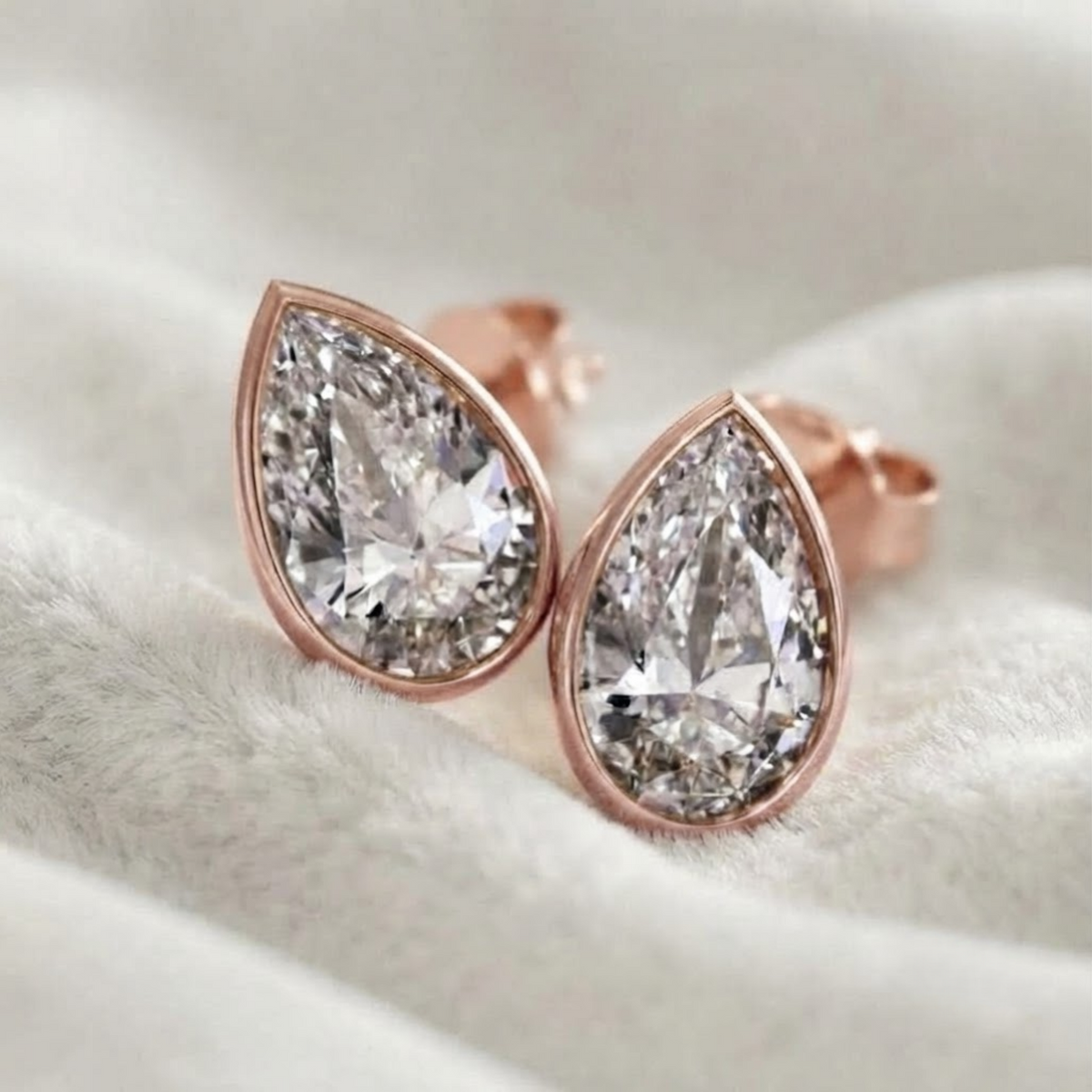 Bezel Set Pear Shape Lab Grown Diamond Stud Earrings