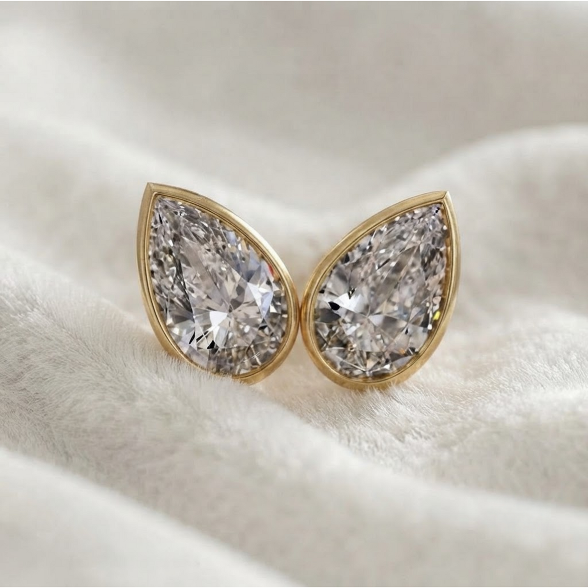 Bezel Set Pear Shape Lab Grown Diamond Stud Earrings
