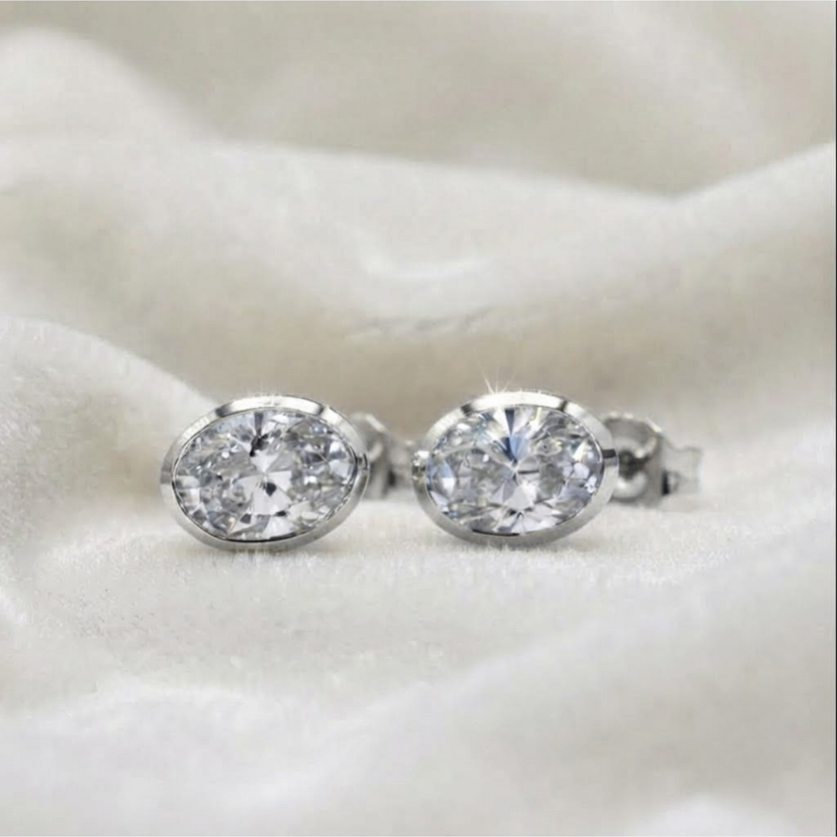 Handcrafted Bezel Set Oval Diamond Studs Earrings