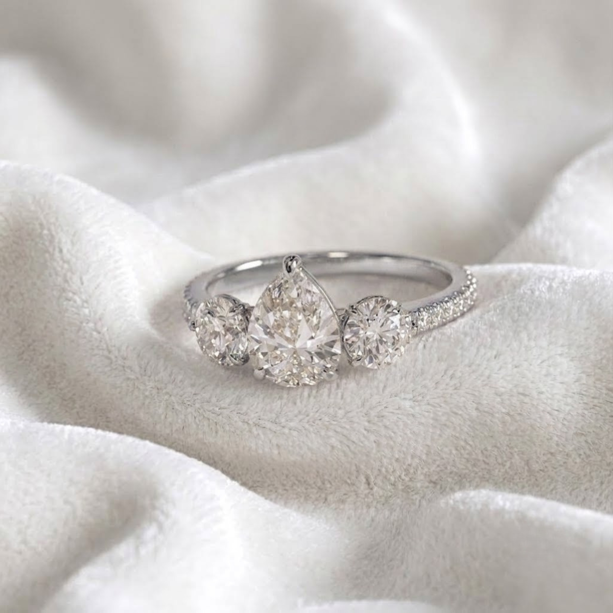Pear Shaped Three Stone Solitaire Engagement Ring