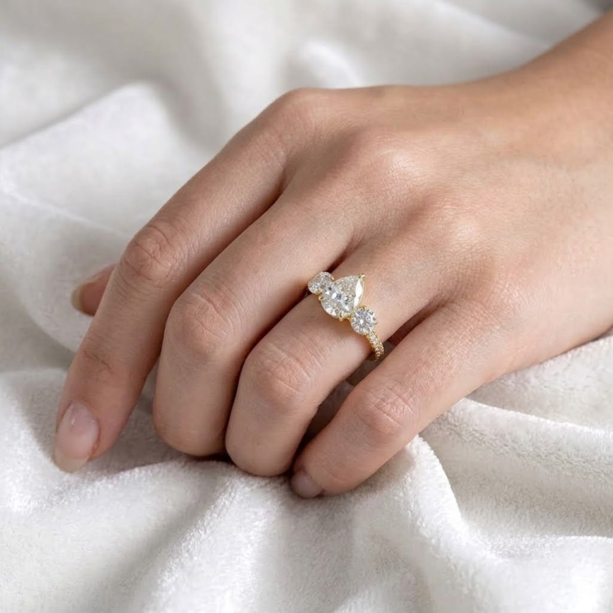 Pear Shaped Three Stone Solitaire Engagement Ring