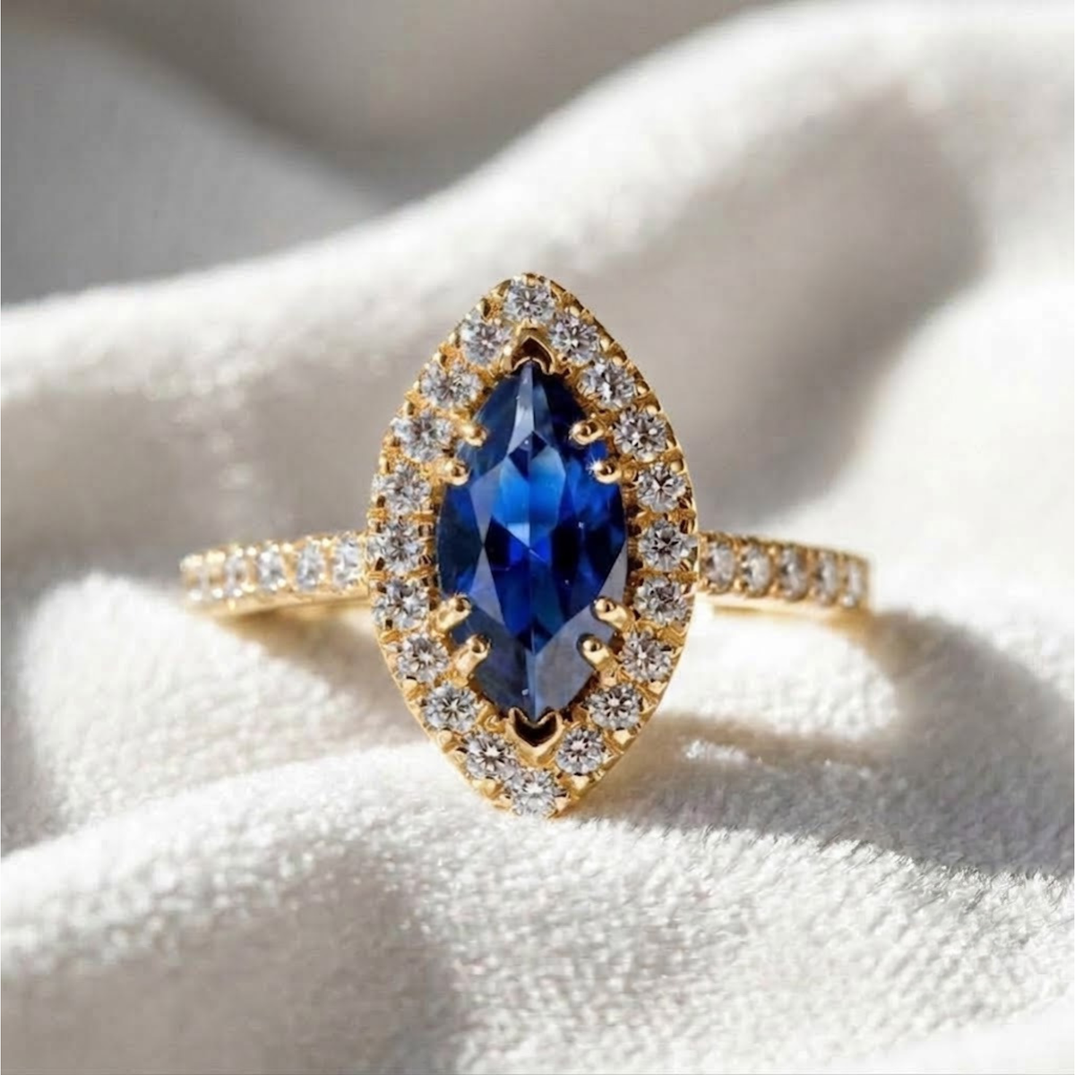 Halo Marquise Blue Sapphire Engagement Ring.