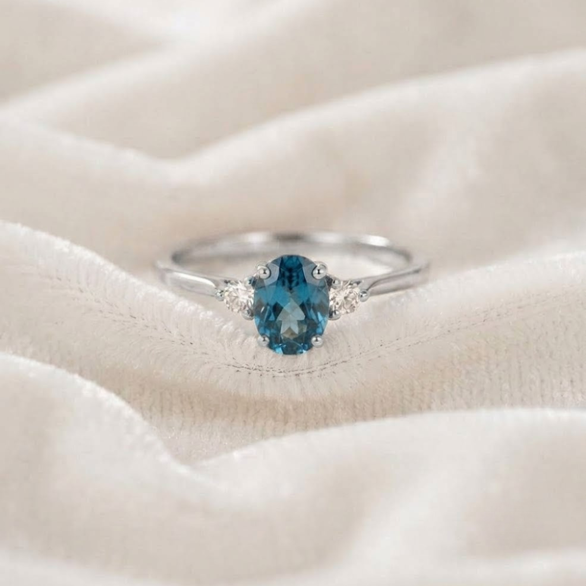 Blue Topaz Ring with Lab Grown Diamond Accent.