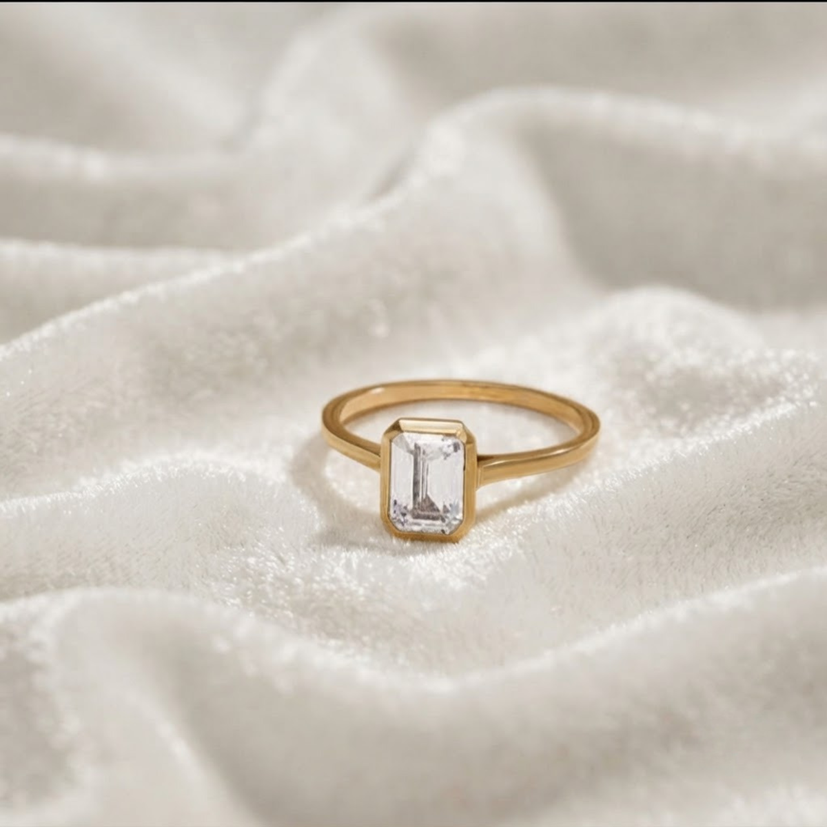 Emerald Cut Bezel Set Engagement Ring