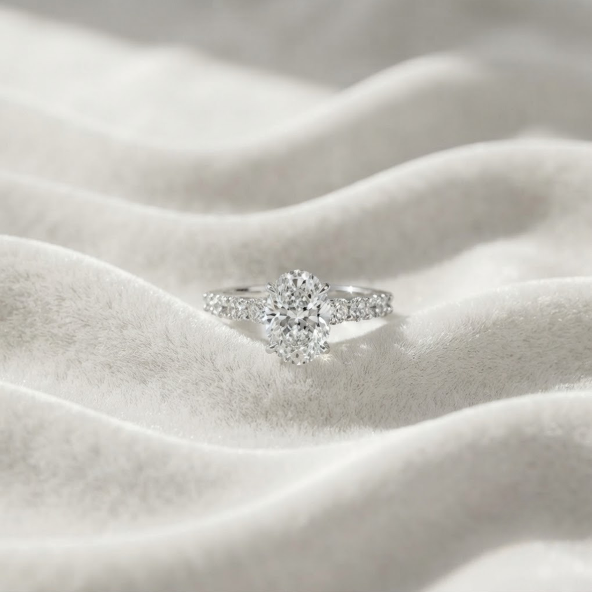 Oval Cut Hidden Halo Engagement Ring