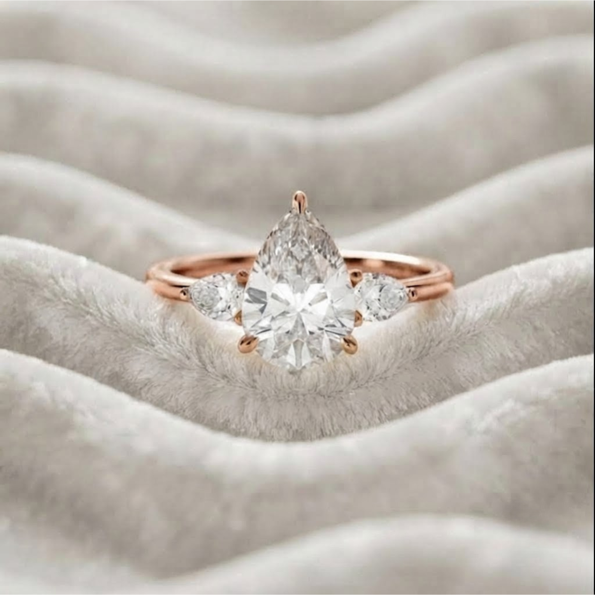 Pear Shaped Three Stone Engagement Ring