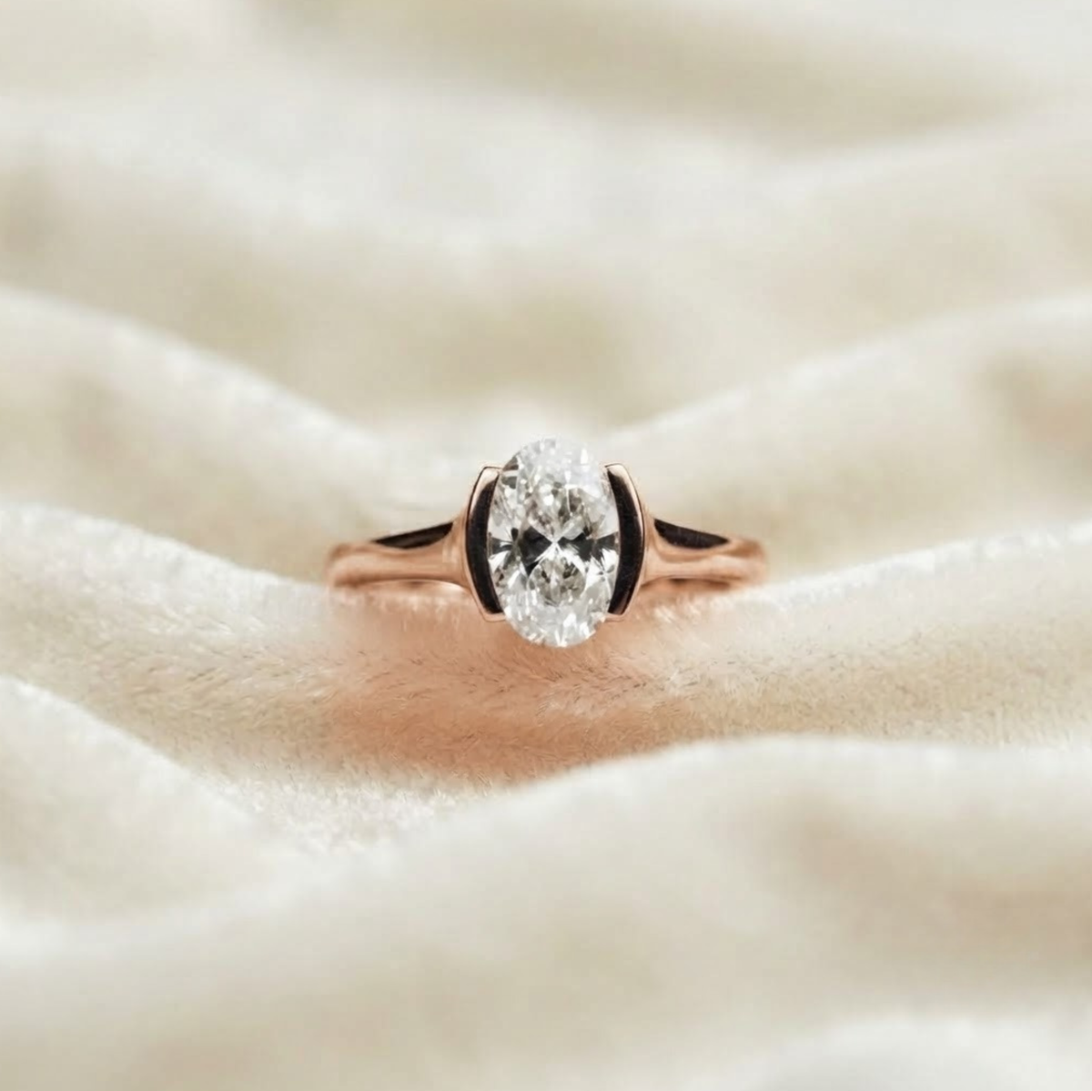 Oval Half Bezel Solitaire Engagement Ring