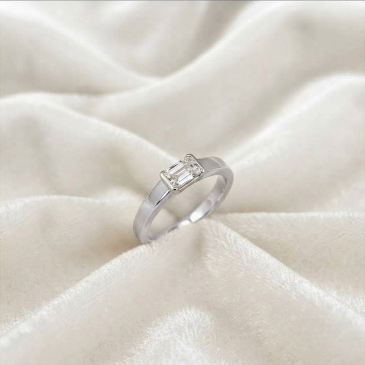 Emerald Cut Half Bezel Engagement Ring
