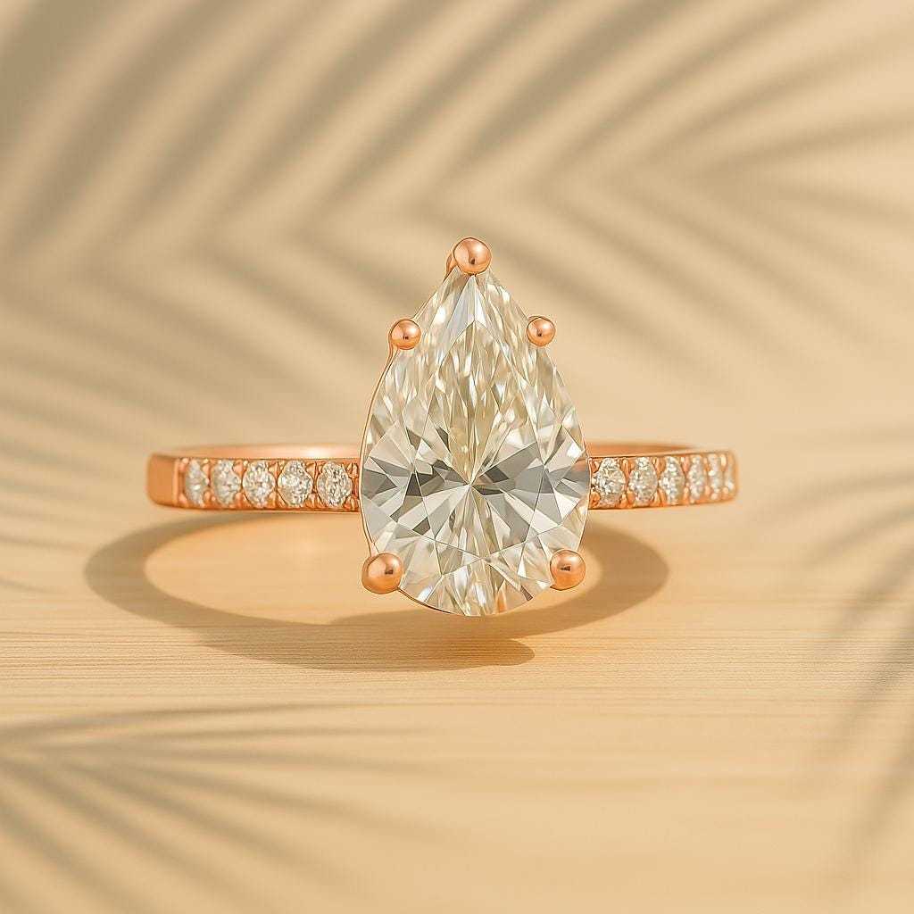 Pear Cut Diamond Halo Engagement Ring