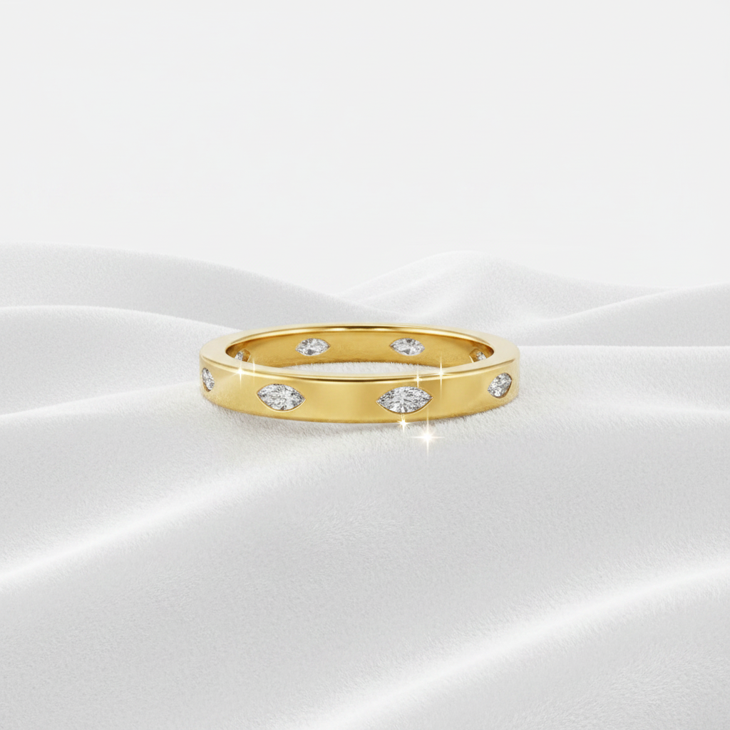 14K gold flush setting diamond eternity stacking band on wavy white velvet, studio lighting