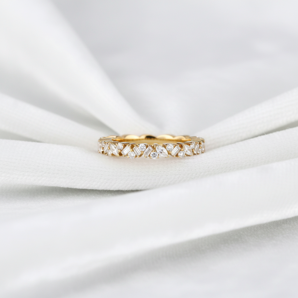 14K gold multi shape lab grown diamond full eternity wedding band on wavy white velvet, studio lighting